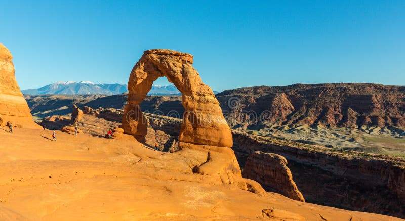 Autumn scenery with deep blue sky and red rocks in the Utah desert, and Delicate Arch