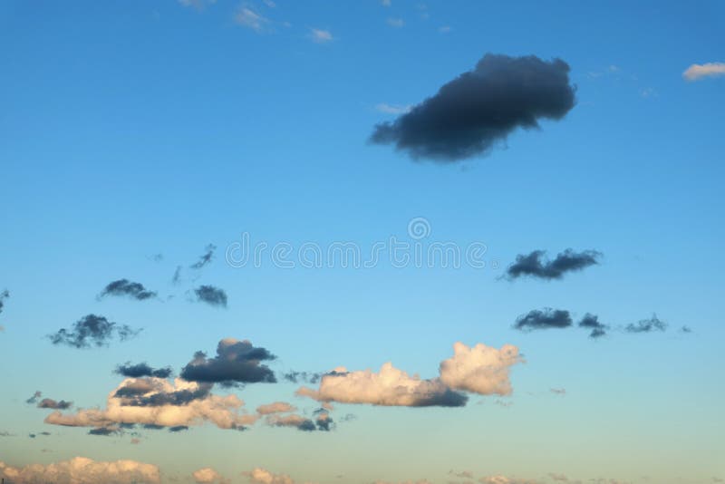 Bright beautiful clear sky with colorful clouds in bloom as the background stock photos Bright beautiful clear sky with colorful clouds in bloom as the background stock photos