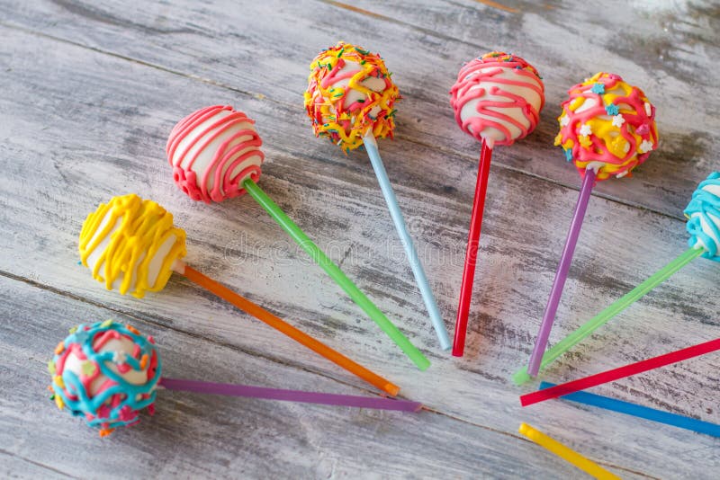 Bright candies on sticks.