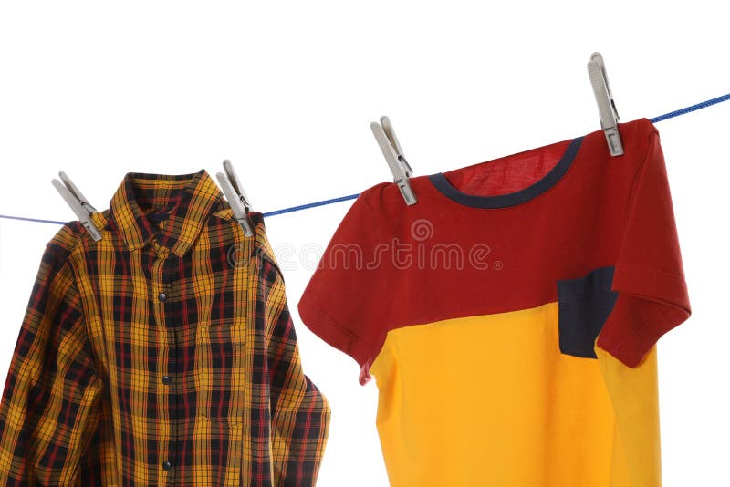 Bright Clothes Drying on Washing Line Against White Background Stock