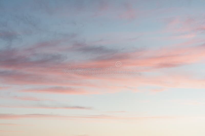 Bright colorful sky at sunset in pink purple and blue colors.