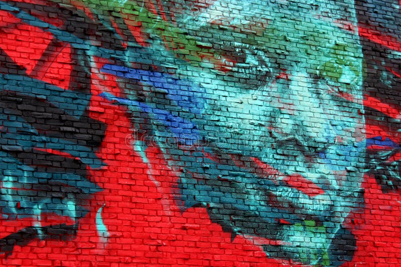 Bright and colorful street art painted on black walls on busy downtown street, Worcester, Mass, 2020