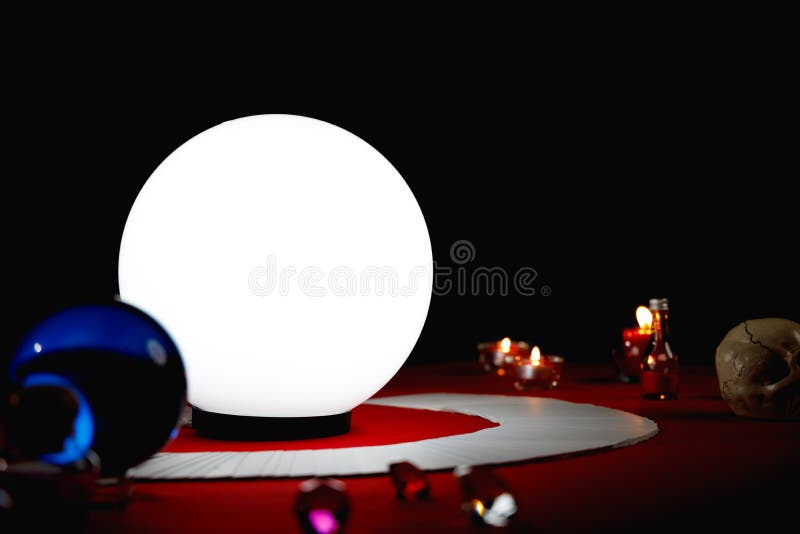 Bright crystal ball on table. royalty free stock photos
