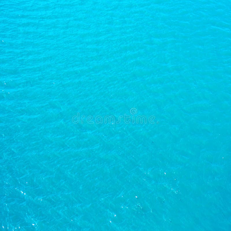 Bright Cyan Blue Sea Water May Use As Background Texture Stock