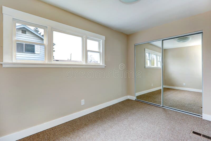 Bright Empty Bedroom With Mirror Door Closet Stock Image ...
