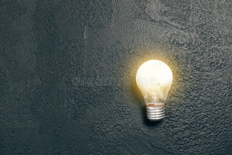 Bright Glowing Light Bulb Idea on a Dark Grunge Blackboard Background.  Creative Inspiration, Planning Ideas Concept Stock Photo - Image of vision,  concept: 226337038