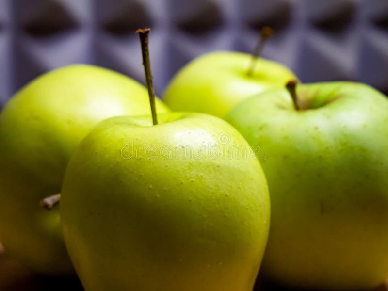Bright green apples, wooden table, wellness concept royalty free stock photos