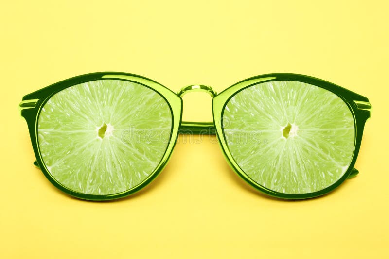 Green sunglasses with lime stock image. Image of lime - 120299423