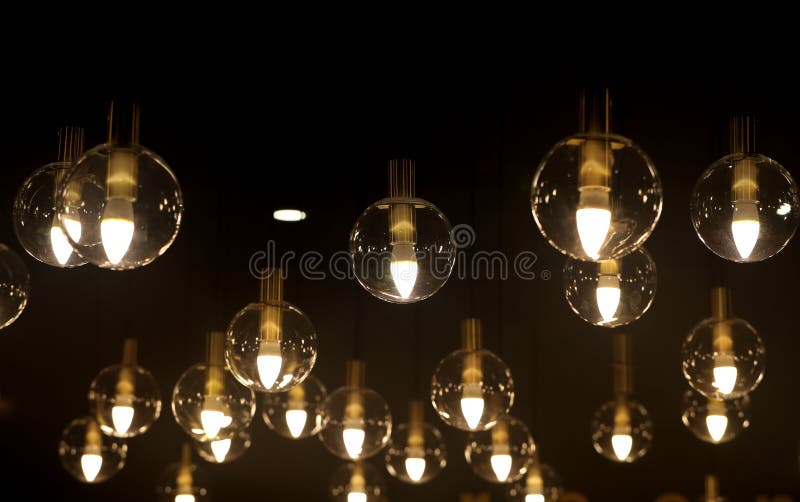 Bright Light Bulbs in a Dark Room for Background Stock Image Image of darkness, background