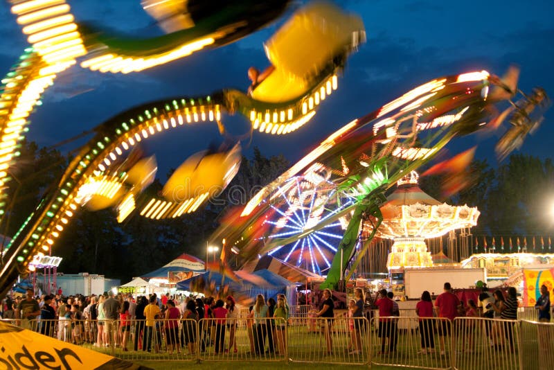 Bright Lights Of Carnival Rides Motion Blur Editorial Image Image