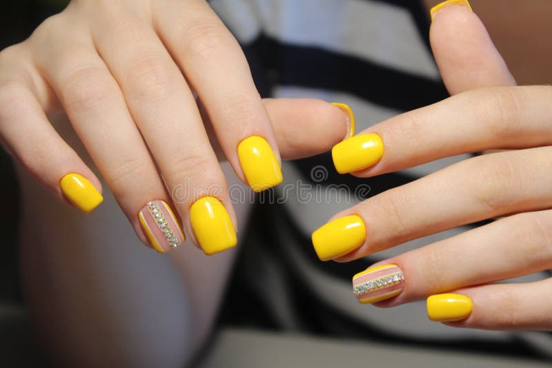 Bright Manicure Design of Yellow Nails Stock Photo - Image of finger ...