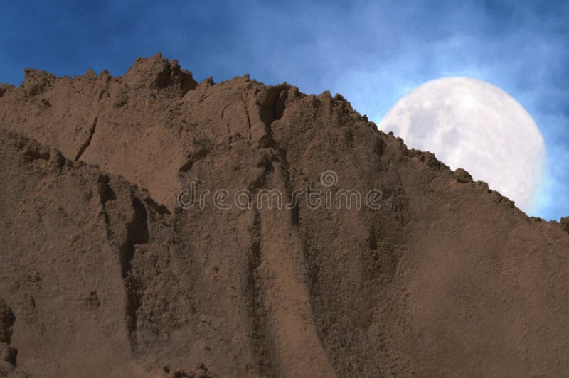 Bright Moon on Desert Landscape