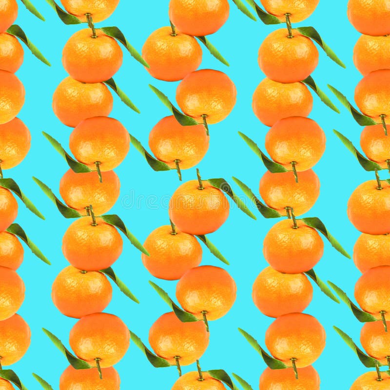 Bright orange tangerines on blue background seamless repeated pattern. Seamless pattern bright oranges stock images, royalty-free photos and pictures
