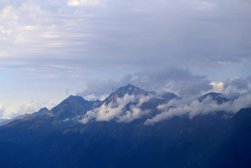 Bright photo autumn landscape with blue mountains royalty free stock photography
