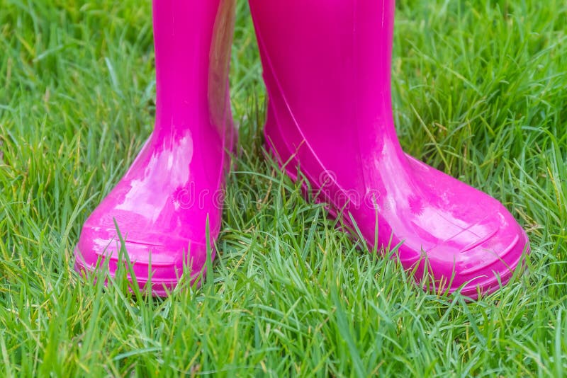 Bright pink rubber boots stock image. Image of season 77946741