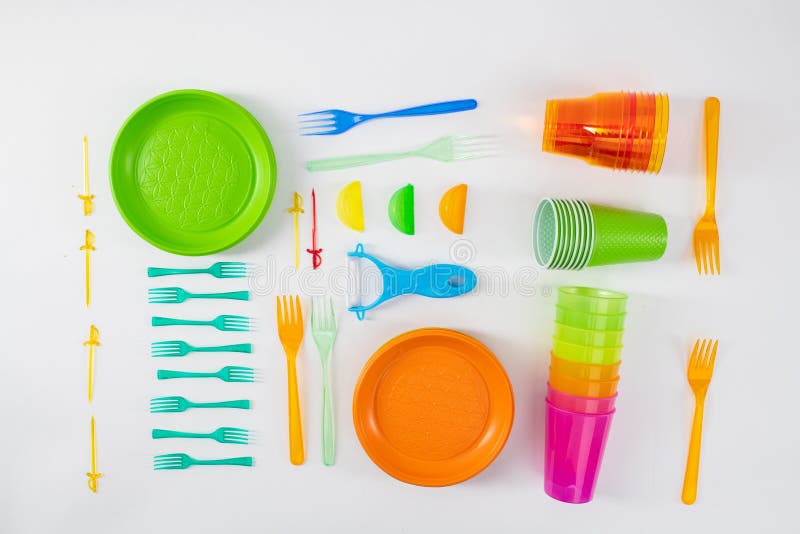 Bright Plates and Forks Lying with Skewers and Cups Stock Photo Image