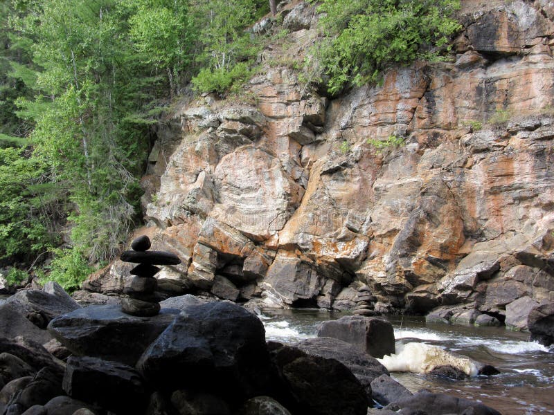 Bright red bedrock cliffs along the Madawaska River