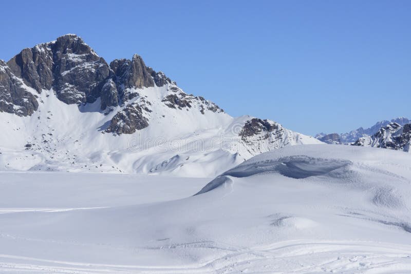 Snow dune and Pale range, San Pellegrino pass royalty free stock photography
