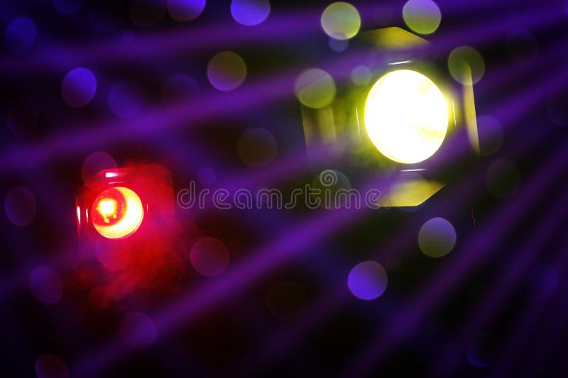 Bright Spotlights and Beams of Light in Night Club, Bokeh Effect Stock ...