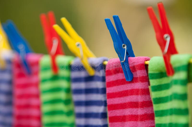 Bright striped socks on clothesline stock photography