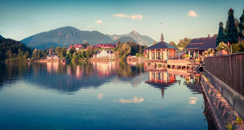 Bright sunny morning in Brauhof village. Colorful summer panorama of the Grundlsee lake, Liezen District of Styria, Austria, Alps. royalty free stock image Bright sunny morning in Brauhof village. Colorful summer panorama of the Grundlsee lake, Liezen District of Styria, Austria, Alps. royalty free stock image