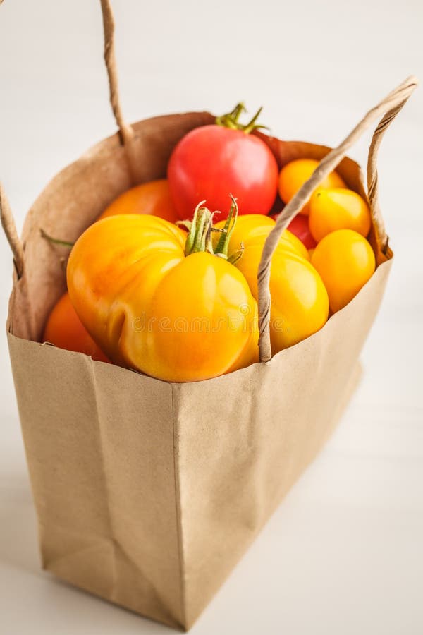 Tomatoes in a paper bag stock image. Image of tomato, delicious 1172709