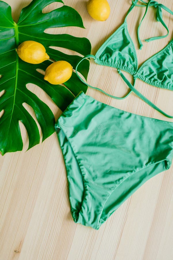 Bright Trendy Bikini on a Wooden Background with Pineapple. Fashionable ...