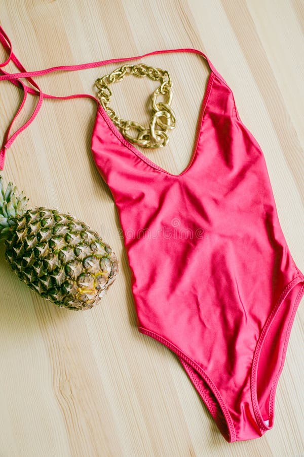 Bright Trendy Bikini on a Wooden Background with Pineapple. Fashionable ...