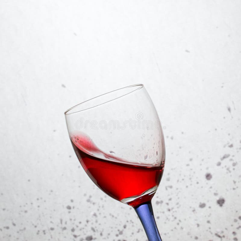 Bright Wine in a Tilted Glass with a Colored Leg Stock Image Image of splash, closeup 120167347