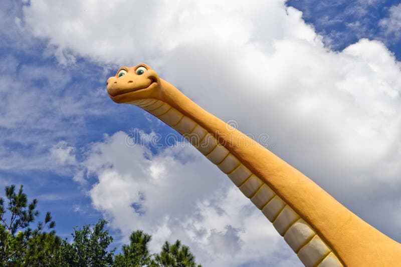 Bright Yellow Dinosaur stock photos
