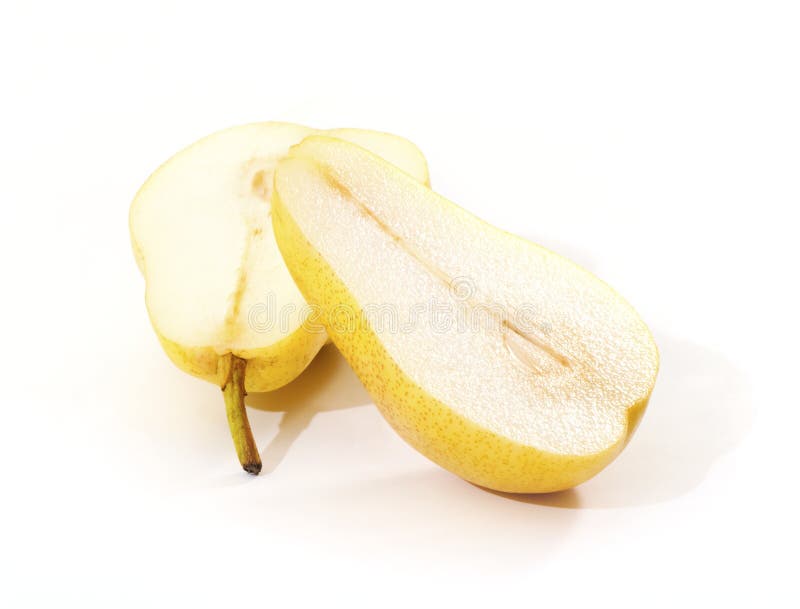 Bright yellow pear cut in half