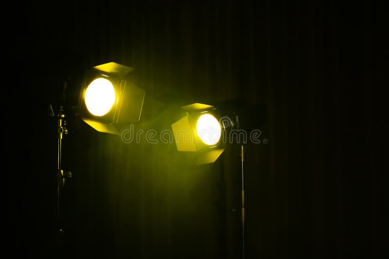 Bright Yellow Spotlights on Dark Stage, Space for Text Stock Photo ...