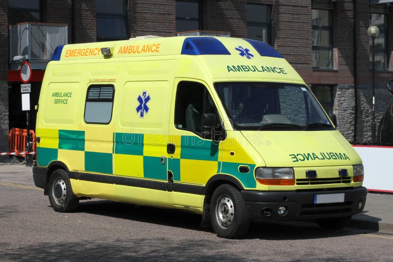 Bright yellow UK Ambulance stock image