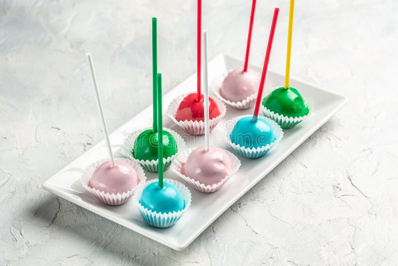 Brightly Colored Cake Pops on a White Plate, Catering Banner, Menu