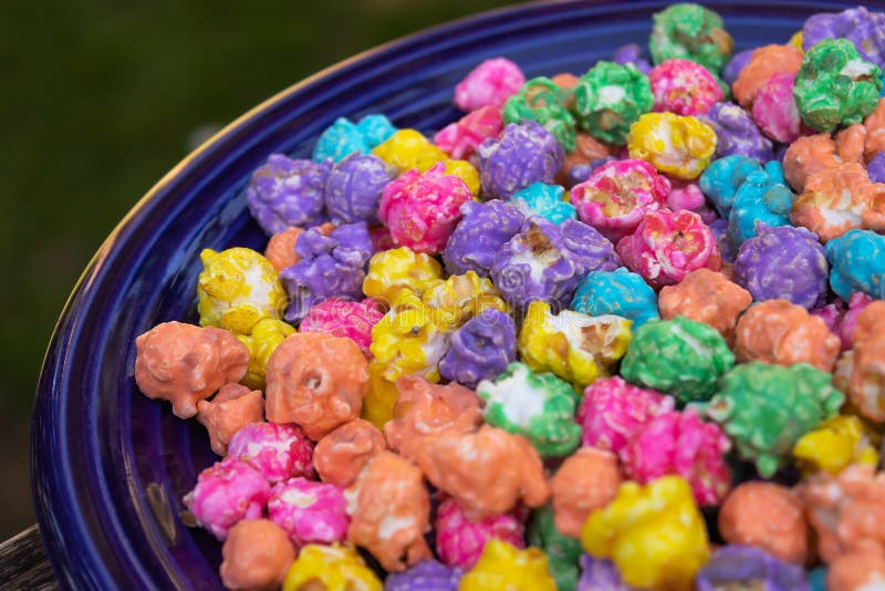 Brightly Colored Rainbow Popcorn on a Blue Plate Stock Image Image of