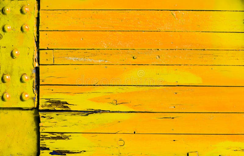 Brightly colored yellow orange wood background