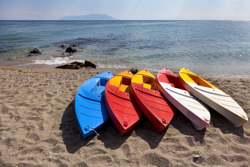 Brightly coloured canoes