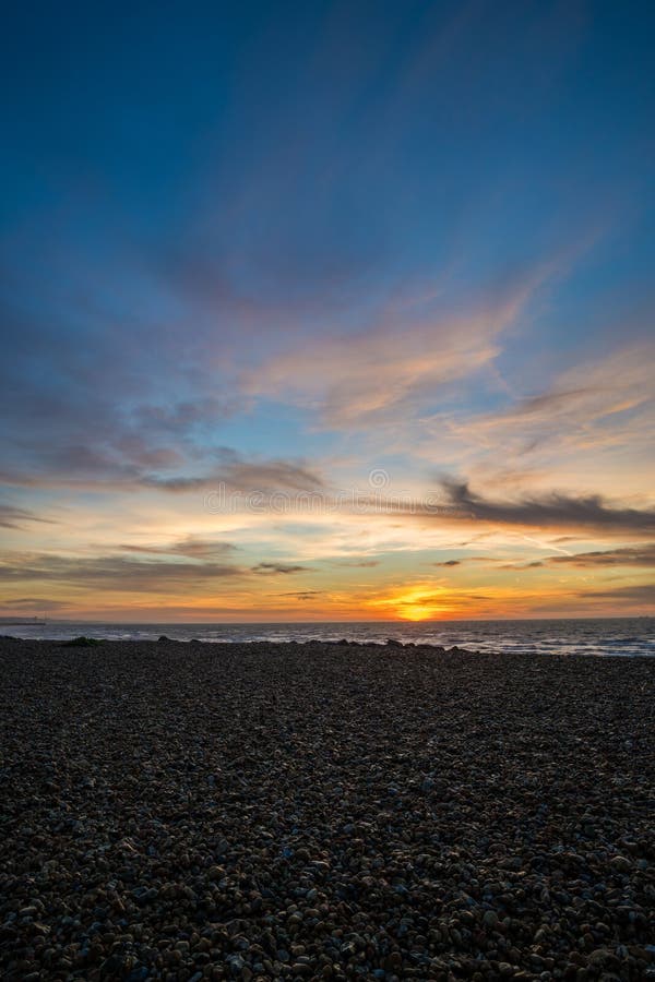 Brighton sunrise portrait stock image. Image of boulders 65761631