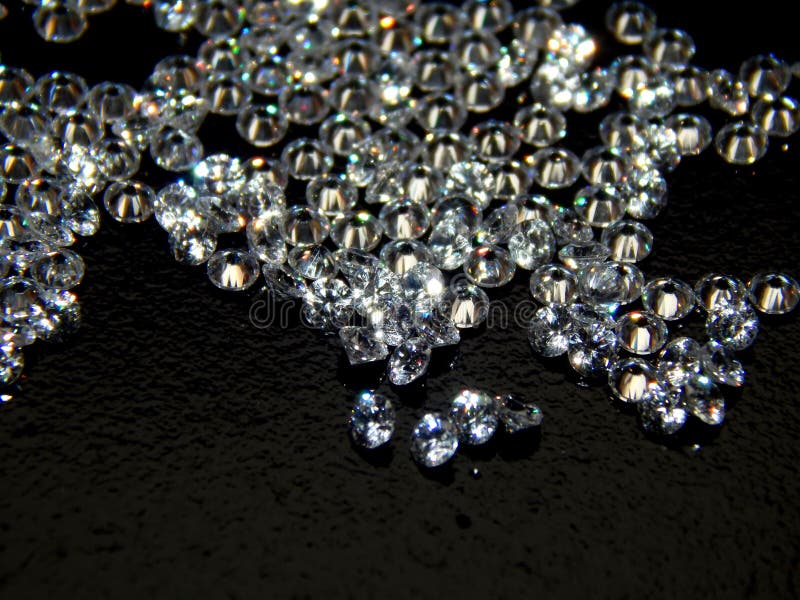 Briljante diamanten op een zwarte close-up als achtergrond royalty-vrije stock fotografie Briljante diamanten op een zwarte close-up als achtergrond royalty-vrije stock fotografie