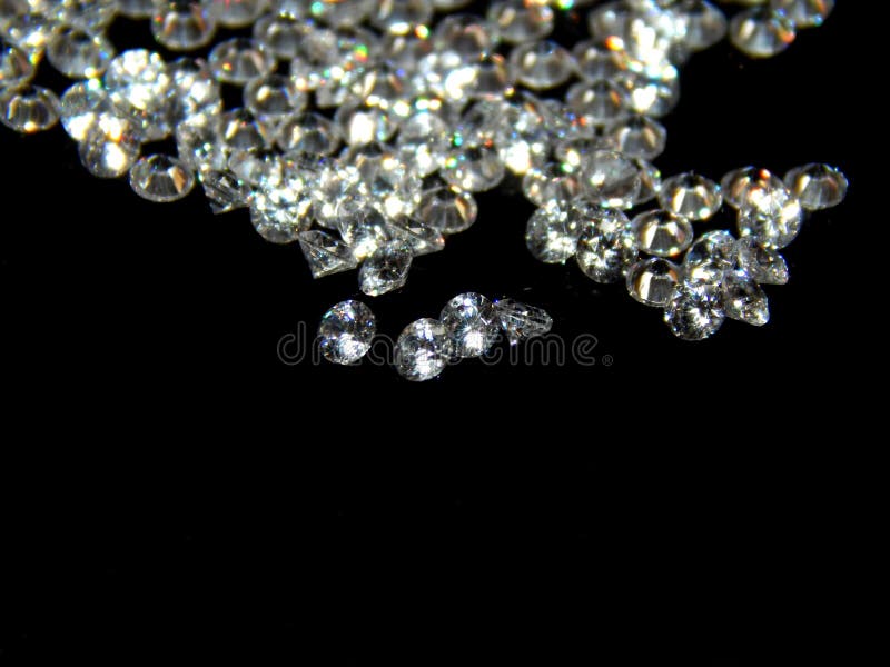 Briljante diamanten op een zwarte close-up als achtergrond royalty-vrije stock fotografie Briljante diamanten op een zwarte close-up als achtergrond royalty-vrije stock fotografie
