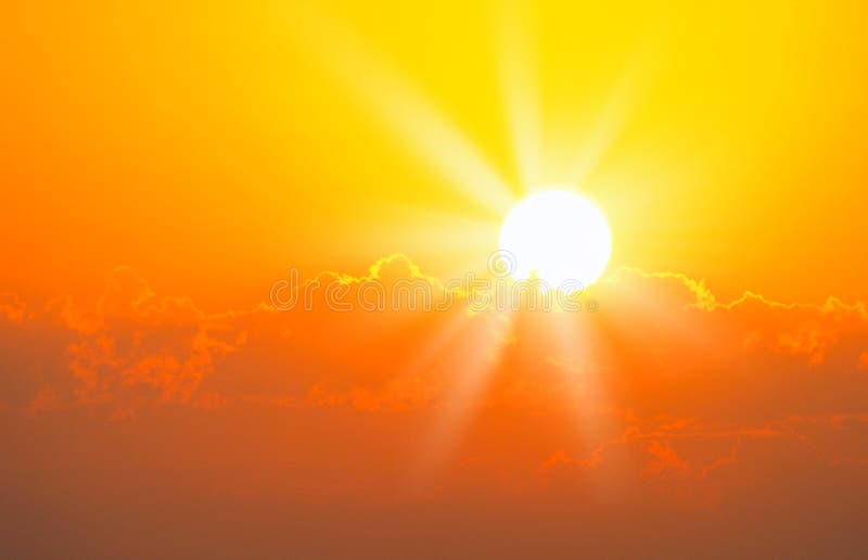 Brilliant orange sunrise over clouds