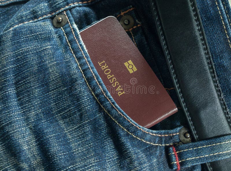 Brim e passaporte azuis imagem de stock royalty free Brim e passaporte azuis imagem de stock royalty free