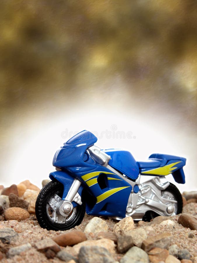 Brinque a motocicleta azul fotografia de stock royalty free Brinque a motocicleta azul fotografia de stock royalty free