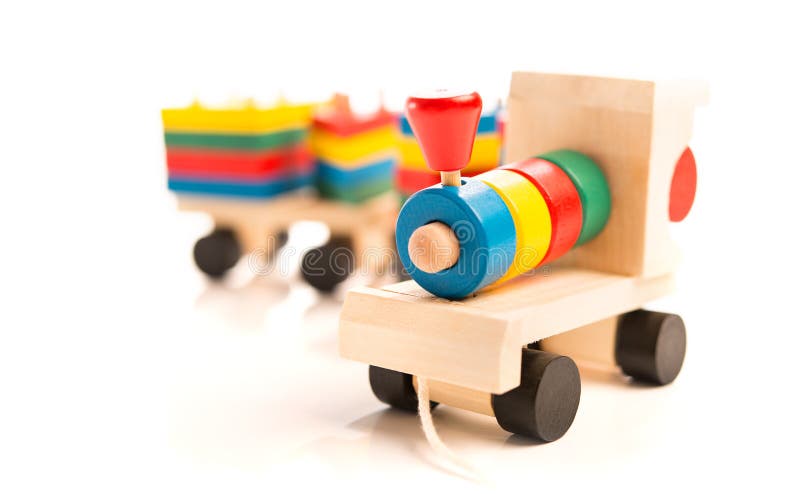 Trem De Madeira Do Brinquedo No Trilho Imagem de Stock - Imagem de bloco,  brinquedos: 5743593