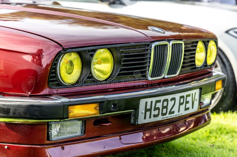 Bristol , UK - October 8, 2023: Original BMW 3 Series with yellow rally head lamps lights old classic retro oldtimer. Bristol , UK - October 8, 2023: Original BMW 3 Series with yellow rally head lamps lights old classic retro oldtimer.