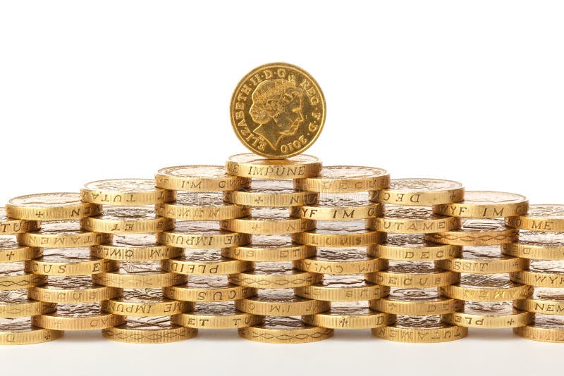 British one pound coins stacked on top of each other. British one pound coins stacked on top of each other