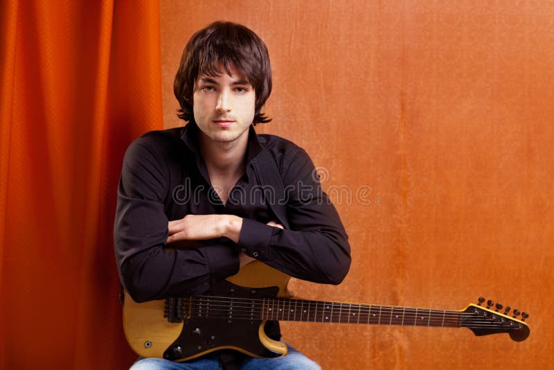 British indie pop rock look young musician guitar player man. British indie pop rock look young musician guitar player man