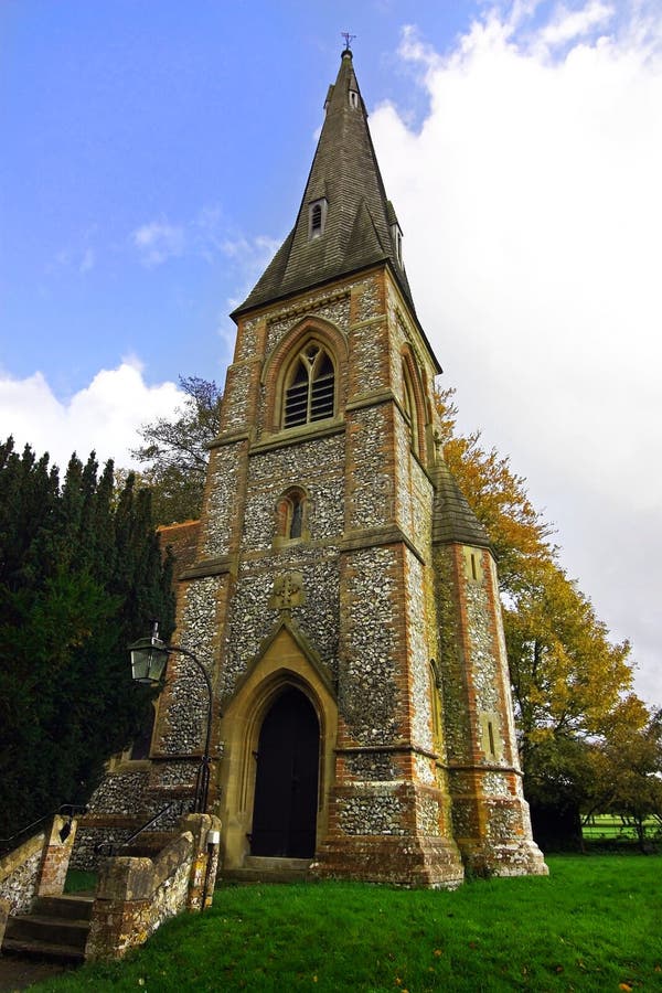 British church tower in an English garden. British church tower in an English garden