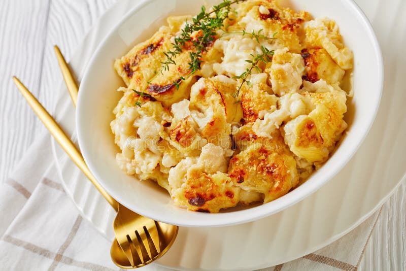 British cauliflower cheese with a cheddar sauce stock image
