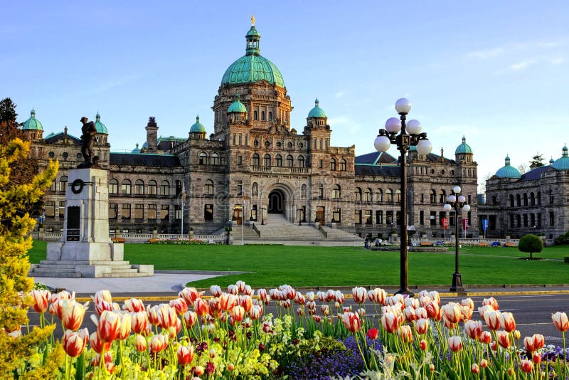 British Columbia provincial parliament building with spring tulips stock photography British Columbia provincial parliament building with spring tulips stock photography